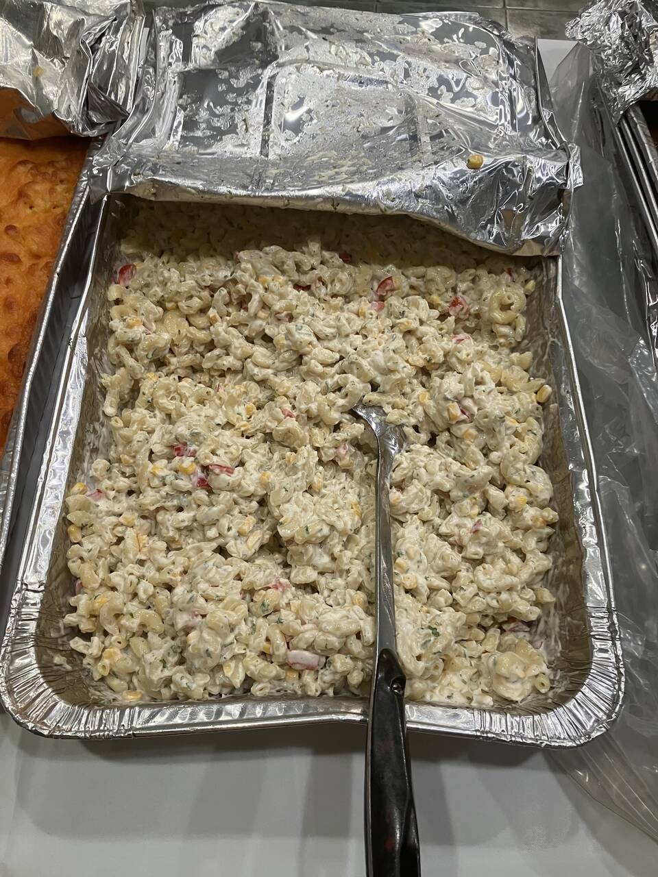 Creamy macaroni salad prepared for the meal