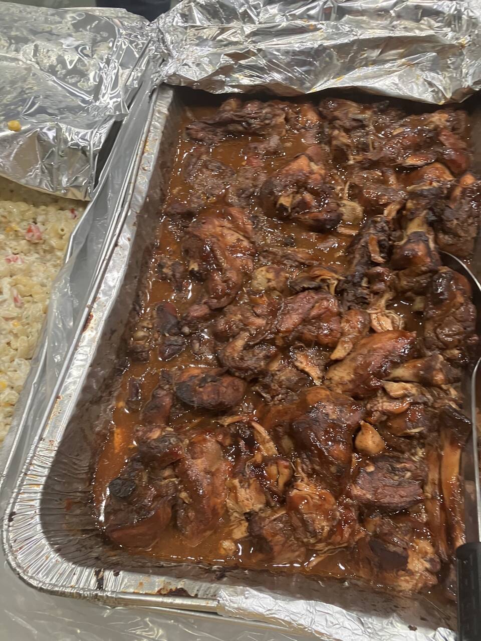 Tray of stewed BBQ chicken ready to serve